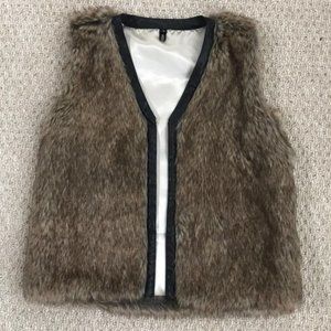 - Faux fur vest with faux leather trim-